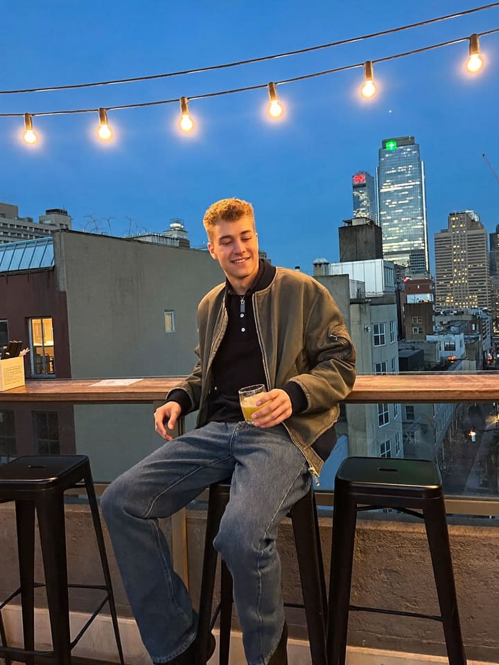 Sit on the stool, drink in hand at DTLA rooftop bar